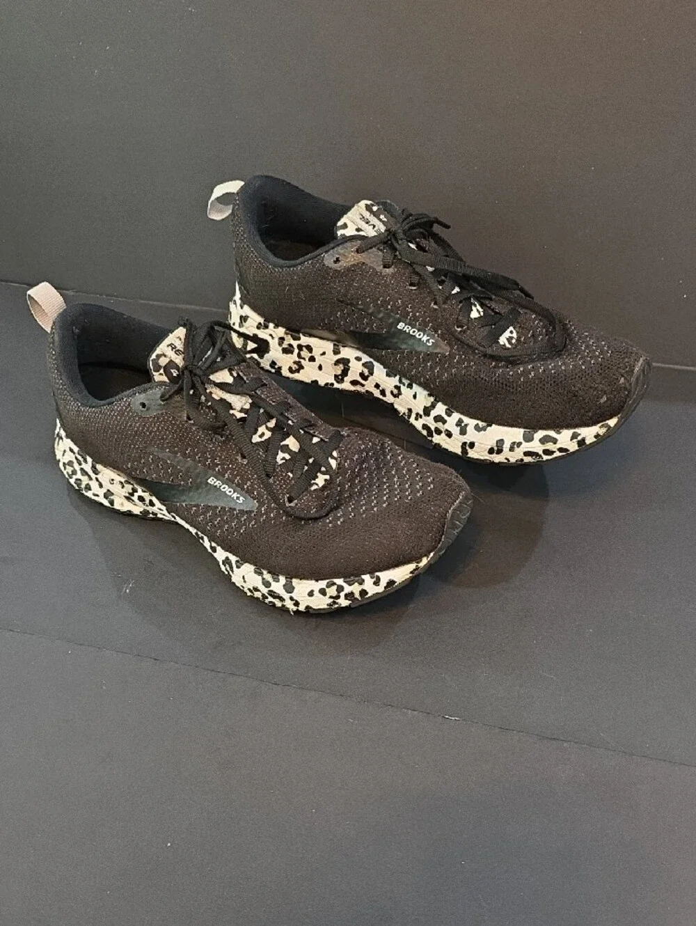 Brooks Revel 4 Women's Black Knit Shoes with Leopard-Print Midsole Size 8.5